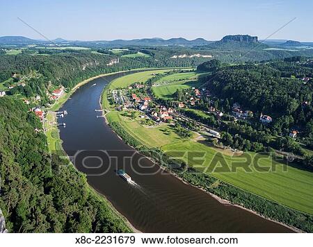 Elbe Sandstone Mountains (Elbsandsteingebirge) in the National Park Saxon Switzerland (Saechsische Schweiz). Bastei viewpoint looking over the river Elbe. Europe, central europe, germany, saxony, June. View Large Photo Image Stock Photo - Elbe Sandstone Mountains (Elbsandsteingebirge) in the National Park Saxon Switzerland (Saechsische Schweiz). Bastei viewpoint looking over the river Elbe. Europe, central europe, germany, saxony, June.. Fotosearch
