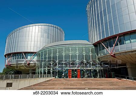 European Court of Human Rights building (ECtHR) with the cylindrical buildings of the courtrooms by the architect Richard Rogers, Strasbourg, Alsace, France. View Large Photo Image Picture - European Court of Human Rights building (ECtHR) with the cylindrical buildings of the courtrooms by the architect Richard Rogers, Strasbourg, Alsace, France.. Fotosearch