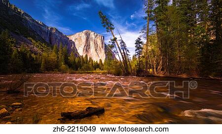 Evening light on El Capitan from the Merced River, Yosemite National Park, California USA. View Large Photo Image Stock Photo - Evening light on El Capitan from the Merced River, Yosemite National Park, California USA.. Fotosearch