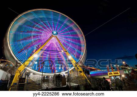 Ferris wheel at night, Calgary Stampede Midway, Calgary, Alberta, Canada. View Large Photo Image Stock Photograph - Ferris wheel at night, Calgary Stampede Midway, Calgary, Alberta, Canada.. Fotosearch