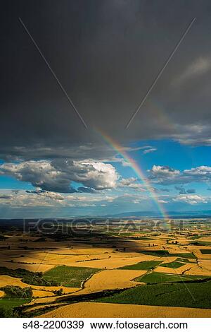 Fields and Rainbow in La Rioja. Spain. Europe. View Large Photo Image Stock Photo - Fields and Rainbow in La Rioja. Spain. Europe.. Fotosearch