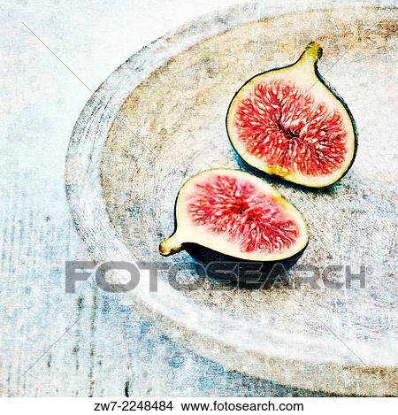 Figs on wooden plate. View Large Photo Image Picture - Figs on wooden plate.. Fotosearch