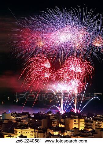 Fireworks Show seen from La Guardiola viewpoint over Sant Carles de la Rapita village. Alfacs Bay is full of sailing boats watching it. Ebro River Delta Natural Park, Tarragona province, Catalonia, Spain. View Large Photo Image Stock Image - Fireworks Show seen from La Guardiola viewpoint over Sant Carles de la Rapita village. Alfacs Bay is full of sailing boats watching it. Ebro River Delta Natural Park, Tarragona province, Catalonia, Spain.. Fotosearch