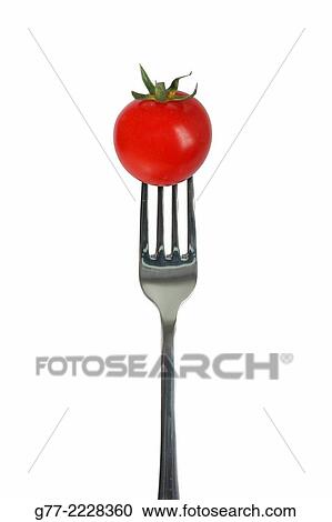 Fork with tomato. View Large Photo Image Stock Image - Fork with tomato.. Fotosearch
