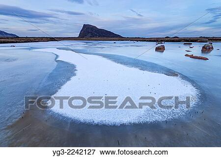 Frozen pond in winter, Gimsøy, Lofoten Islands, Norway. View Large Photo Image Stock Photo - Frozen pond in winter, Gimsøy, Lofoten Islands, Norway.. Fotosearch