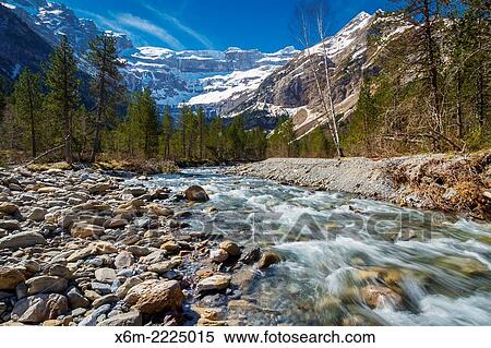 Stock Photography - Gavarnie glacier cirque and Gave de Gavarnie river.. Fotosearch