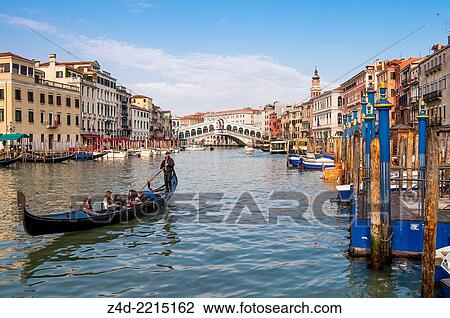 Gondola on the Grand Canal and Rialto Bridge. Venice, Veneto region, Italy, Europe. View Large Photo Image Stock Image - Gondola on the Grand Canal and Rialto Bridge. Venice, Veneto region, Italy, Europe.. Fotosearch