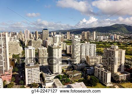 Hawaii, Hawaiian, Honolulu, Waikiki Beach, resort, high rise building, hotels, condominium buildings, Makiki, Lower Punchbowl, Tantalus, mountains. View Large Photo Image Stock Photo - Hawaii, Hawaiian, Honolulu, Waikiki Beach, resort, high rise building, hotels, condominium buildings, Makiki, Lower Punchbowl, Tantalus, mountains.. Fotosearch