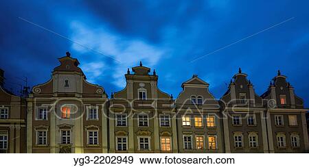 Stock Photo - Historic buildings along Rynek market square, Opole, Silesia, Poland.. Fotosearch