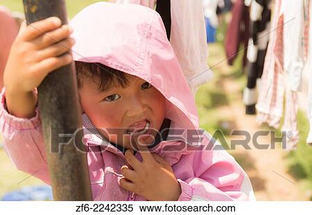 Kathmandu Nepal Nepali child aged 4 at a playground in Nayapati Eastern Kathmandu 1. View Large Photo Image Stock Photography - Kathmandu Nepal Nepali child aged 4 at a playground in Nayapati Eastern Kathmandu 1.. Fotosearch