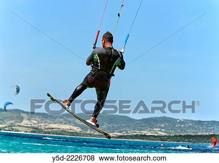 Stock Photo - Kitesurfing, Sardinia, Italy.. Fotosearch