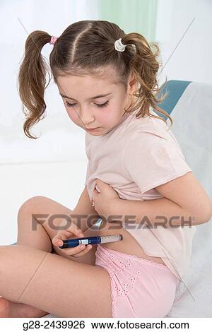 Little girl with bunches suffering from diabetes injecting herself insulin View Large Photo Image Stock Photograph - Little girl with bunches suffering from diabetes injecting herself insulin. Fotosearch