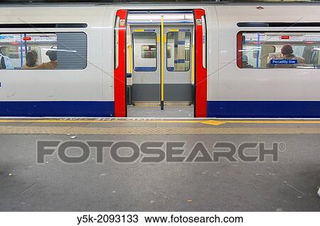 London, United Kingdom. Underground train, parked at a platform of underground station ´Acton Town´, South-West London. View Large Photo Image Stock Image - London, United Kingdom. Underground train, parked at a platform of underground station ´Acton Town´, South-West London.. Fotosearch