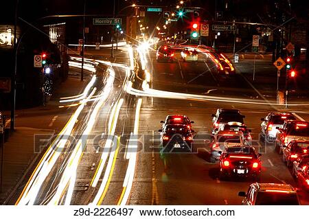 Long exposure of traffic at night in downtown Vancouver, British Columbia. View Large Photo Image Stock Photo - Long exposure of traffic at night in downtown Vancouver, British Columbia.. Fotosearch
