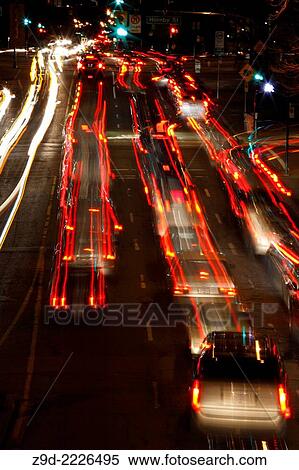 Long exposure of traffic at night in downtown Vancouver, British Columbia. View Large Photo Image Stock Photography - Long exposure of traffic at night in downtown Vancouver, British Columbia.. Fotosearch