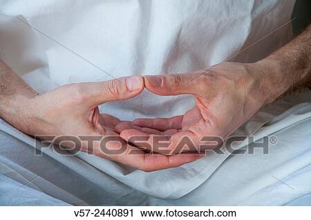 Man practicing yoga, sitting in the lotus position. Close view. View Large Photo Image Stock Image - Man practicing yoga, sitting in the lotus position. Close view.. Fotosearch