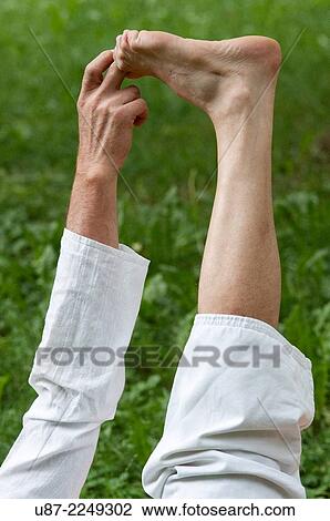 Stock Image - Man Practicing Yoga.. Fotosearch