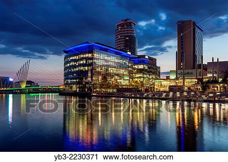 Media City Uk and The Media City Footbridge, Salford Quays, Manchester, England. View Large Photo Image Stock Image - Media City Uk and The Media City Footbridge, Salford Quays, Manchester, England.. Fotosearch