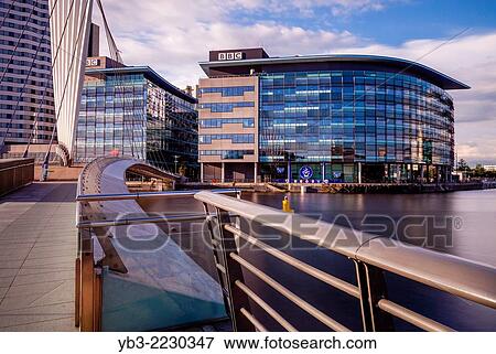 Media City Uk and The Media City Footbridge, Salford Quays, Manchester, England. View Large Photo Image Stock Photo - Media City Uk and The Media City Footbridge, Salford Quays, Manchester, England.. Fotosearch