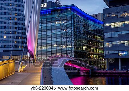 Media City Uk and The Media City Footbridge, Salford Quays, Manchester, England. View Large Photo Image Stock Photography - Media City Uk and The Media City Footbridge, Salford Quays, Manchester, England.. Fotosearch