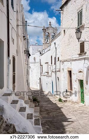 Medieval whitewashed streets of Ostuni, Puglia, Italy. View Large Photo Image Stock Photograph - Medieval whitewashed streets of Ostuni, Puglia, Italy.. Fotosearch