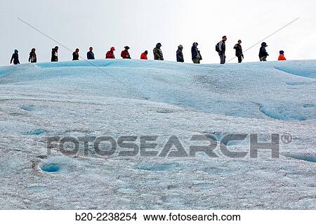 Mini trekking. Walk on the glacier with crampons. Perito Moreno glacier. Los Glaciares National Park. Near El Calafate. Santa Cruz province. Patagonia. Argentina. View Large Photo Image Picture - Mini trekking. Walk on the glacier with crampons. Perito Moreno glacier. Los Glaciares National Park. Near El Calafate. Santa Cruz province. Patagonia. Argentina.. Fotosearch