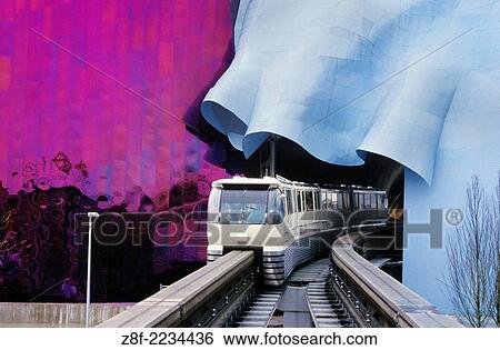 Monorail emerging from tunnel through Experience Music Project at Seattle Center; Seattle, Washington. View Large Photo Image Stock Photograph - Monorail emerging from tunnel through Experience Music Project at Seattle Center; Seattle, Washington.. Fotosearch