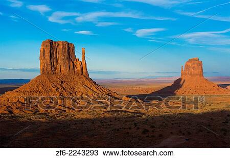 Monument Valley Utah desert mittens in panoramic of Western landscape at sunset Natioanal Park shadow of one mitten on another. View Large Photo Image Stock Image - Monument Valley Utah desert mittens in panoramic of Western landscape at sunset Natioanal Park shadow of one mitten on another.. Fotosearch