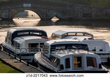 Stock Image - Morning light Potter Heigham Bridge. River Thurne Norfolk Broads England UK.. Fotosearch