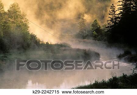 Morning mists over a river, Greater Sudbury, Ontario, Canada. View Large Photo Image Stock Photography - Morning mists over a river, Greater Sudbury, Ontario, Canada.. Fotosearch