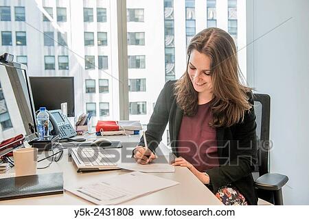 New York, USA. Female office manager to the Dutch Consulate General, down town Manhattan at her office. View Large Photo Image Stock Photo - New York, USA. Female office manager to the Dutch Consulate General, down town Manhattan at her office.. Fotosearch