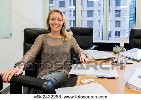 New York, USA. Female teacher at ´t Klokhuis, a school for Dutch language and culture, with her teaching readers during an instruction to het students. View Large Photo Image Stock Photo - New York, USA. Female teacher at ´t Klokhuis, a school for Dutch language and culture, with her teaching readers during an instruction to het students.. Fotosearch