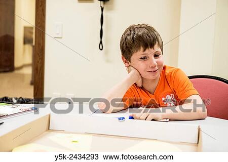 New York, USA. Male primary school student at ´t Klokhuis, a school for Dutch language and culture, during a class room instruction. View Large Photo Image Stock Image - New York, USA. Male primary school student at ´t Klokhuis, a school for Dutch language and culture, during a class room instruction.. Fotosearch