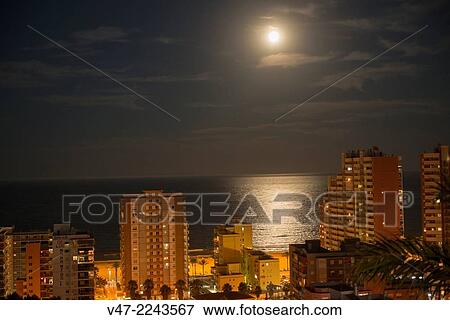 Stock Photo - Night shot of the beach of Cullera Cullera, Valencia, Spain. Fotosearch