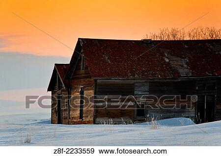 Old barns at prairie sunset in winter. View Large Photo Image Stock Photo - Old barns at prairie sunset in winter.. Fotosearch
