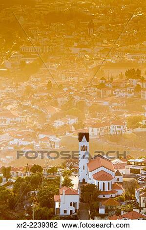 Panoramic view of Funchal at sunset from das Neves viewer, Madeira, Portugal. View Large Photo Image Stock Image - Panoramic view of Funchal at sunset from das Neves viewer, Madeira, Portugal.. Fotosearch