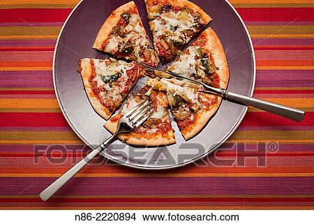 pita pizza - eggplant zuchinni and peppers. View Large Photo Image Picture - pita pizza - eggplant zuchinni and peppers.. Fotosearch