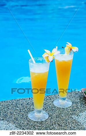 Poolside tropical drinks at Matangi Private Island Resort, Fiji. View Large Photo Image Stock Image - Poolside tropical drinks at Matangi Private Island Resort, Fiji.. Fotosearch