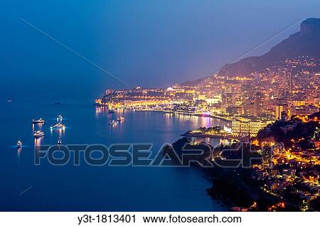 Principality of Monaco, Monte Carlo. Bay of Monaco at night. View Large Photo Image Stock Image - Principality of Monaco, Monte Carlo. Bay of Monaco at night.. Fotosearch