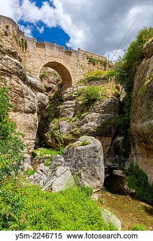 Puente Viejo (Old Bridge) over Guadalevín River, Ronda, Malaga province, Andalusia, Spain, Europe. View Large Photo Image Stock Photography - Puente Viejo (Old Bridge) over Guadalevín River, Ronda, Malaga province, Andalusia, Spain, Europe.. Fotosearch