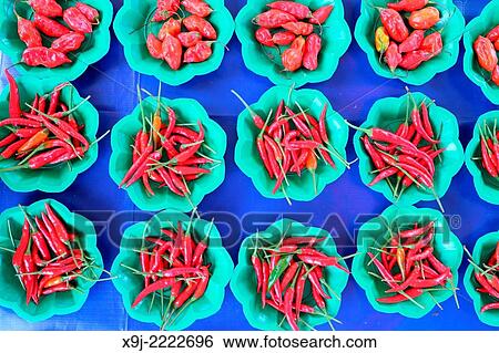Red chilli peppers display in local market, asia View Large Photo Image Stock Photograph - Red chilli peppers display in local market, asia. Fotosearch