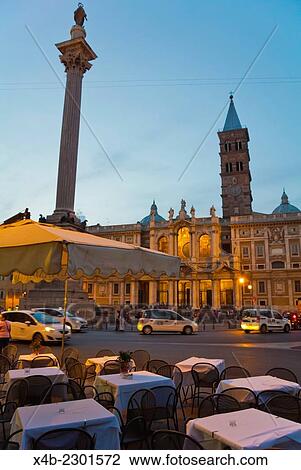 Stock Image - Restaurant terrace at Piazza di Santa Maria Maggiore, Monti district, central Rome, Italy.. Fotosearch
