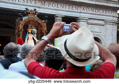 Rome, Italy 19th July 2014 Festa de Noantri celebrations - The solemn procession in honour of Madonna del Carmine also known as ´´de ´Noantri´´, the patron saint of the citizens of the Trastevere district View Large Photo Image Stock Photograph - Rome, Italy 19th July 2014 Festa de Noantri celebrations - The solemn procession in honour of Madonna del Carmine also known as ´´de ´Noantri´´, the patron saint of the citizens of the Trastevere district. Fotosearch