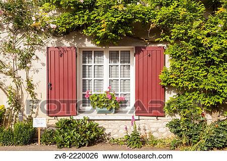 Roses cover a house in the village of Chedigny, France. The village holds a rose festival every May. View Large Photo Image Stock Photograph - Roses cover a house in the village of Chedigny, France. The village holds a rose festival every May.. Fotosearch