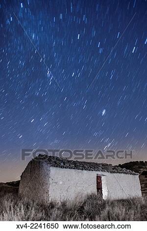 Rural House by night. Long exposure vertical on rural scenic. Aragon, Mos, Spain. View Large Photo Image Stock Image - Rural House by night. Long exposure vertical on rural scenic. Aragon, Mos, Spain.. Fotosearch