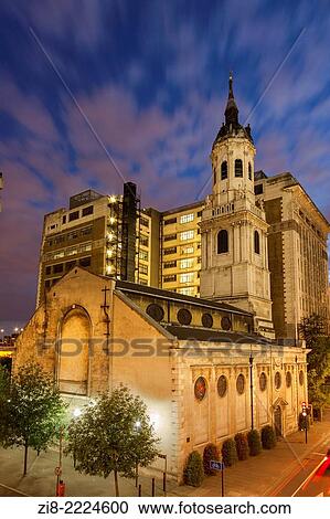 Stock Image - Saint Magnum The Martyr church on Lower Thames Road at night, The City of London, England. Fotosearch