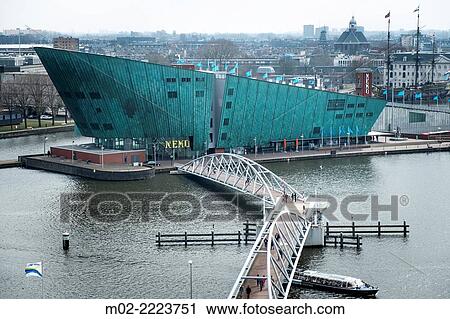 Science Museum. Nemo building is in the form of a green ship. Nemo was designed by renowned Italian architect Renzo Piano; August 01, 2012 Amsterdam, Holland. View Large Photo Image Stock Image - Science Museum. Nemo building is in the form of a green ship. Nemo was designed by renowned Italian architect Renzo Piano; August 01, 2012 Amsterdam, Holland.. Fotosearch