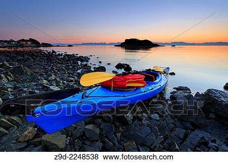 Sea kayak at sunrise, Pipers Lagoon Park, Nanaimo, Vancouver Island, British Columbia. View Large Photo Image Stock Photo - Sea kayak at sunrise, Pipers Lagoon Park, Nanaimo, Vancouver Island, British Columbia.. Fotosearch