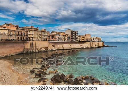 Seafront Promenade, Lungomare, in the historic center of Syracuse. The old town is located on Ortigia Island in the Ionian Sea, Syracuse, Sicily, Italy, Europe. View Large Photo Image Stock Image - Seafront Promenade, Lungomare, in the historic center of Syracuse. The old town is located on Ortigia Island in the Ionian Sea, Syracuse, Sicily, Italy, Europe.. Fotosearch