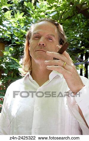 Smoking man. Coyoacan, Mexico City. View Large Photo Image Stock Image - Smoking man. Coyoacan, Mexico City.. Fotosearch